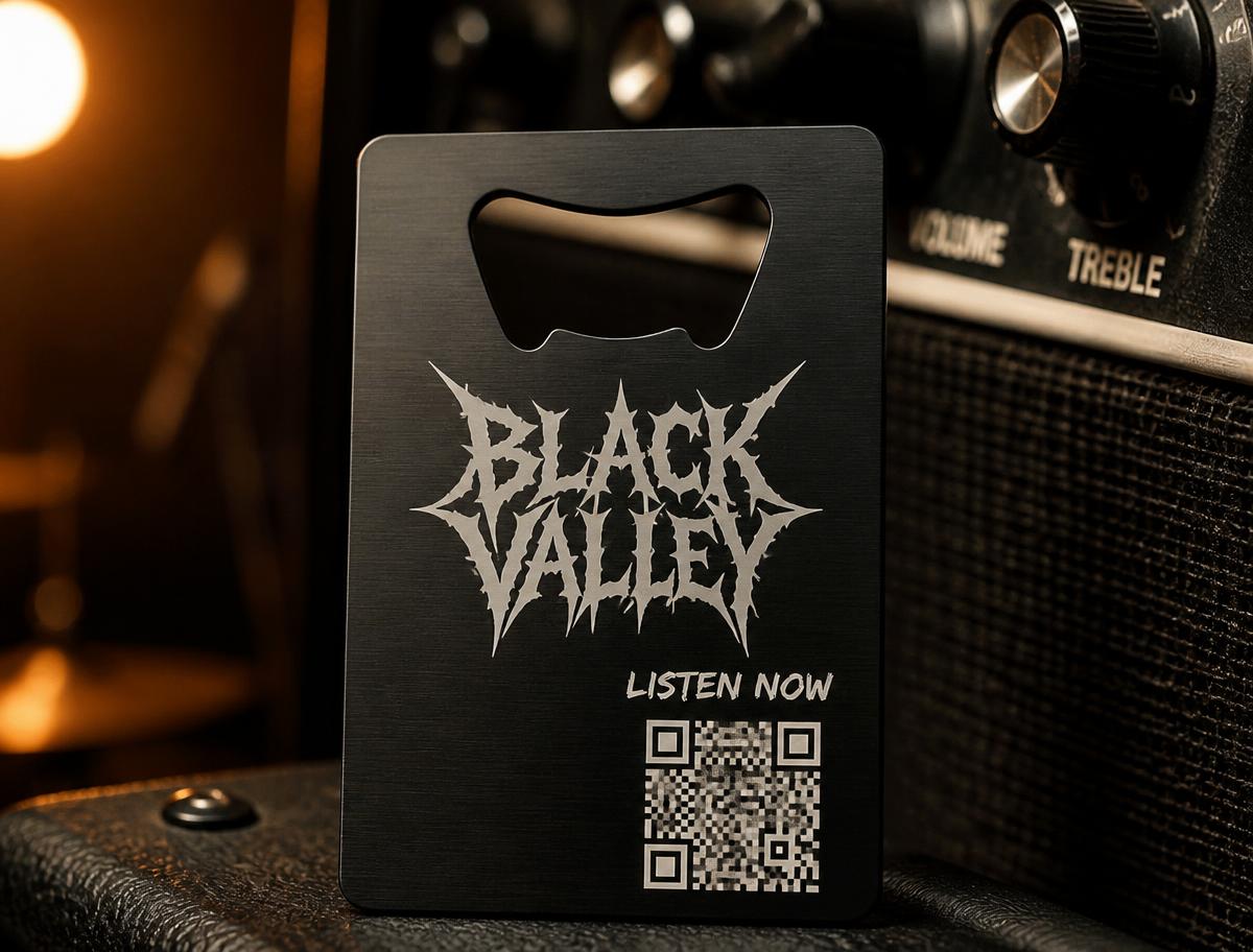 musician metal business card with band logo, QR code to a Spotify release, and tour dates on the back