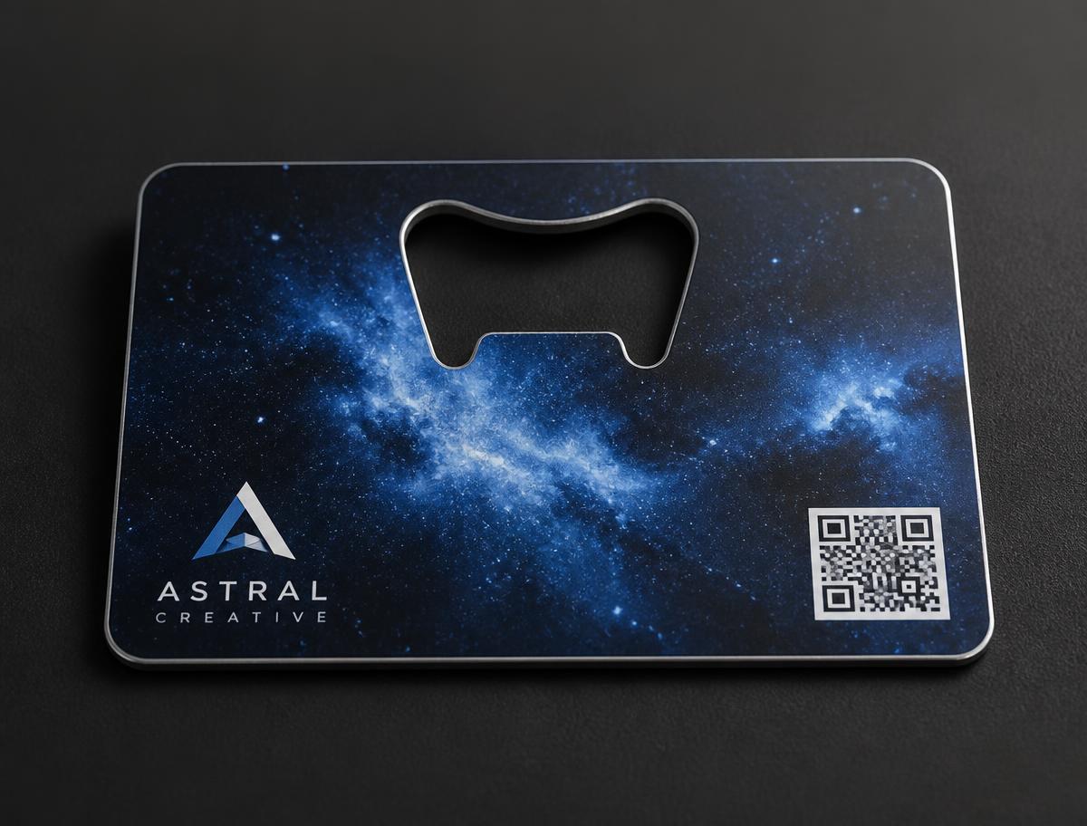 space-themed metal business card with nebula print and bottle opener cutout