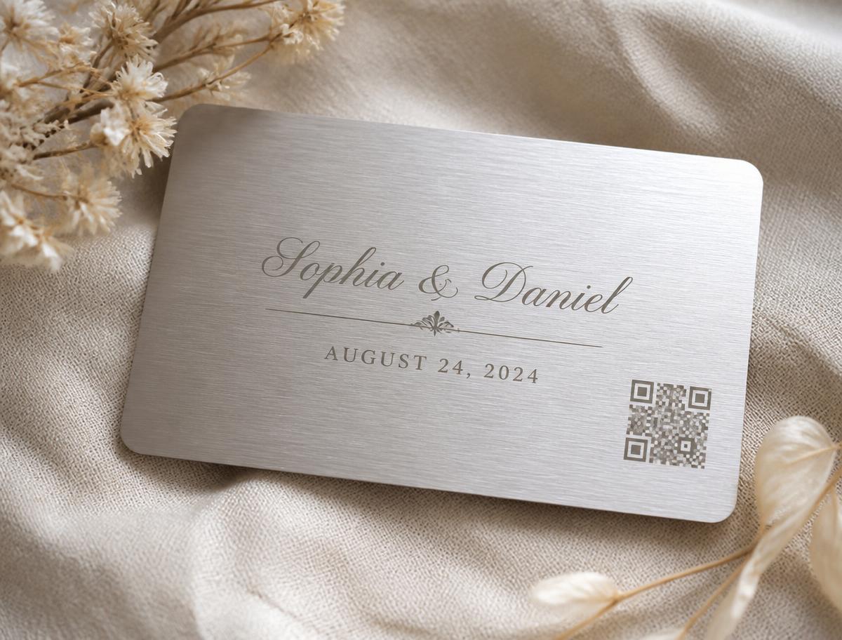 elegant wedding favor metal card with engraved couple names and date plus a QR code to a photo gallery